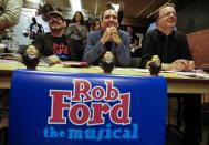 Writers P. Joseph Regan (L), Brett McCaig (C), and composer Anthony Bastinon watch auditions for "Rob Ford The Musical: The Birth of a Ford Nation" in Toronto, June 16, 2014. Toronto Mayor Rob Ford, who shot to prominence last year after admitting to smoking crack, buying illegal drugs and driving after drinking, insisted for months he did not have a problem. But last month he said he would take time off to deal with his drinking issues. REUTERS/Mark Blinch (CANADA - Tags: POLITICS SOCIETY ENTERTAINMENT)