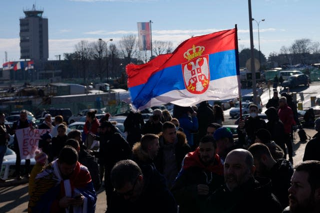 Fans wait to greet Novak Djokovic at Nikola Tesla airport in Belgrade