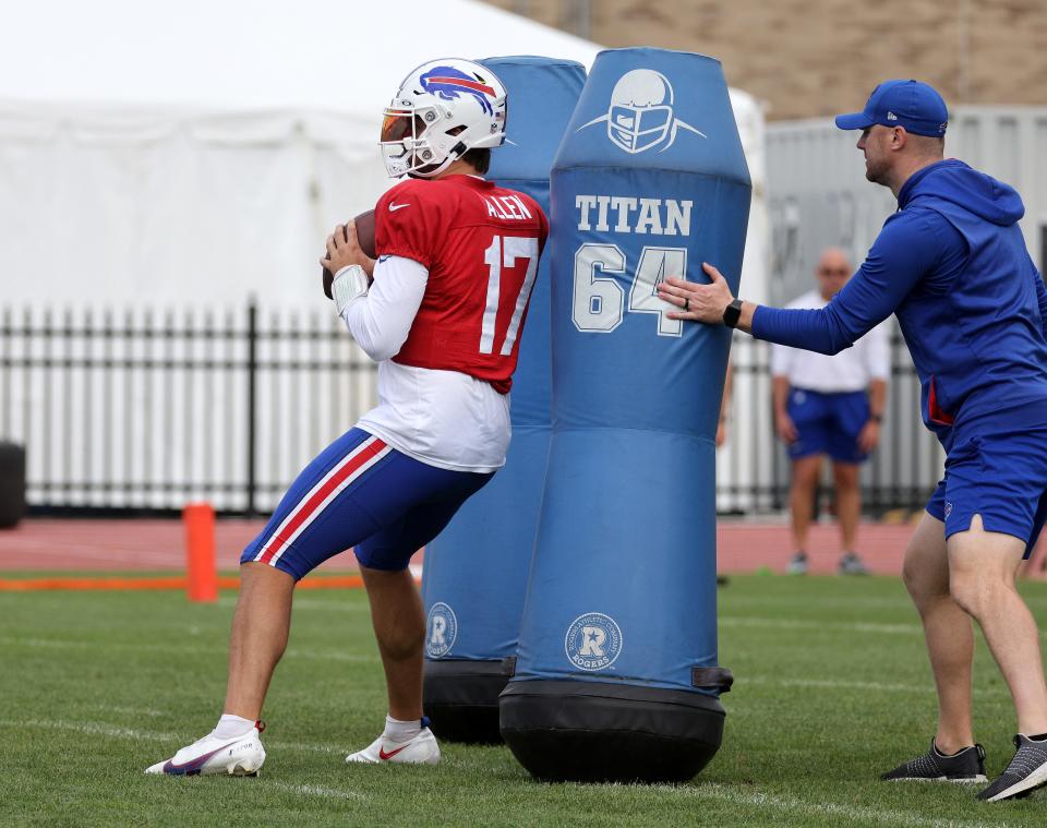 Bills quarterback Josh Allen goes through a drill to simulate pressure in the pocket during training camp. (USAT)