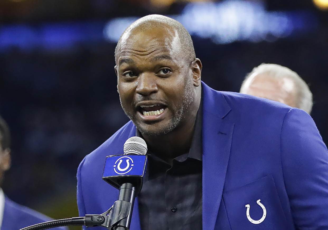 FILE - Former Indianapolis Colts defensive end Dwight Freeney speaks during his Ring of Honor induction ceremony during half time of an NFL football game against the Miami Dolphins in Indianapolis on Nov. 10, 2019. Freeney was elected to the College Football Hall of Fame on Monday, Jan. 9, 20923. (AP Photo/Darron Cummings, File)