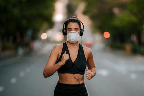   <span class="attribution"><a class="link " href="https://www.shutterstock.com/image-photo/girl-does-sports-mask-on-street-1721395486" rel="nofollow noopener" target="_blank" data-ylk="slk:Daniel Carpio/Shutterstock;elm:context_link;itc:0;sec:content-canvas">Daniel Carpio/Shutterstock</a></span>