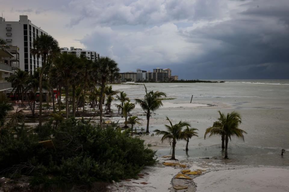 High tide roars in at Fort Myers Beach ahead of Hurricane Idalia on Tuesday.