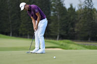 Collin Morikawa putts on the ninth green during the third round of the Tournament of Champions golf event, Saturday, Jan. 7, 2023, at Kapalua Plantation Course in Kapalua, Hawaii. (AP Photo/Matt York)