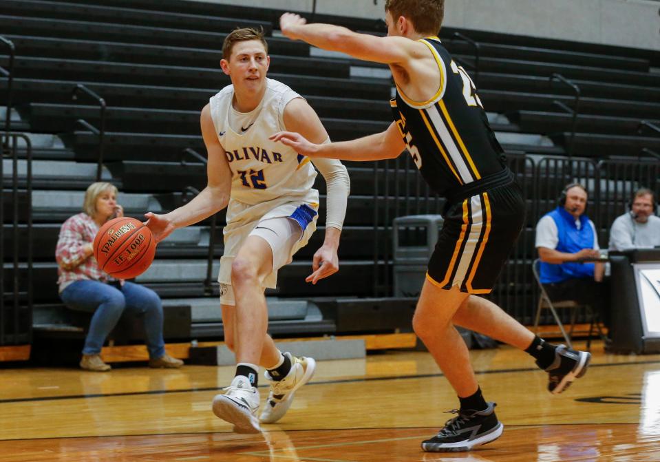 Kyle Pock, of Bolivar, looks to pass the ball during the Liberators game against Smith Cotton in the opening round of the Willard Basketball Classic at Willard High School on Thursday, Dec. 2, 2021.