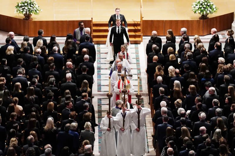 Church officials lead the coffin out of the church after the funeral for former Supreme Court Justice Sandra Day O'Connor at Washington National Cathedral in Washington, D.C., on Tuesday. Photo by Bonnie Cash/UPI