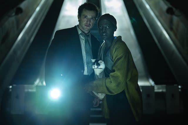 <p>Gareth Gatrell/Paramount Pictures</p> Joseph Quinn and Lupita Nyong'o in "A Quiet Place: Day One"