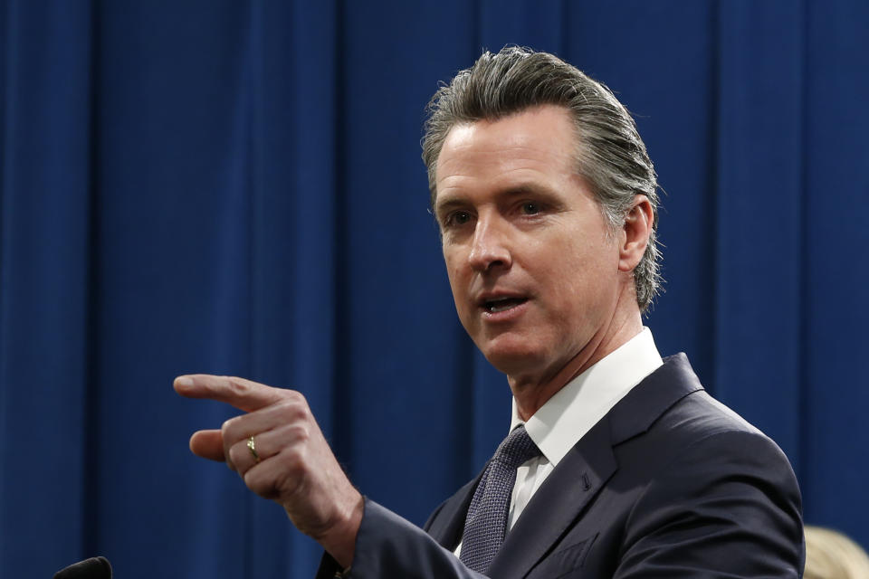 California Gov. Gavin Newsom speaks to reporters about his executive order advising that non-essential gatherings of more than 250 people should be canceled until at least the end of March, during a news conference in Sacramento, Calif., Thursday, March 12, 2020. (AP Photo/Rich Pedroncelli)