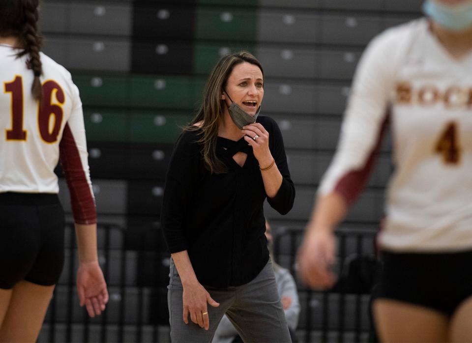 Rocky Mountain head coach Nicole Jones calls to her team during the volleyball match at Fossil Ridge High School in Fort Collins, Colo. on Wednesday, April 21, 2021.