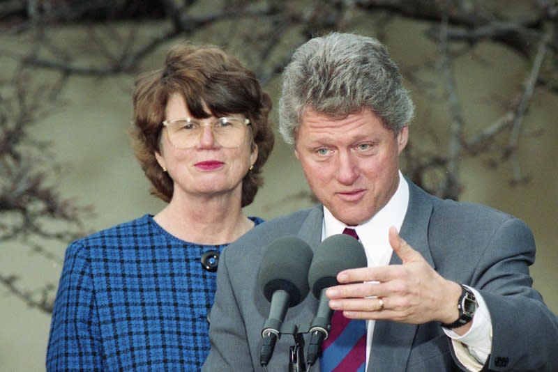 U.S. President Bill Clinton speaks as Janet Reno, the first female nominee for attorney general, listens in the Rose Garden of the White House in Washington on February 11, 1993. On January 12, 1994, Clinton asked Reno to appoint an independent counsel to investigate the Whitewater land deal. UPI File Photo