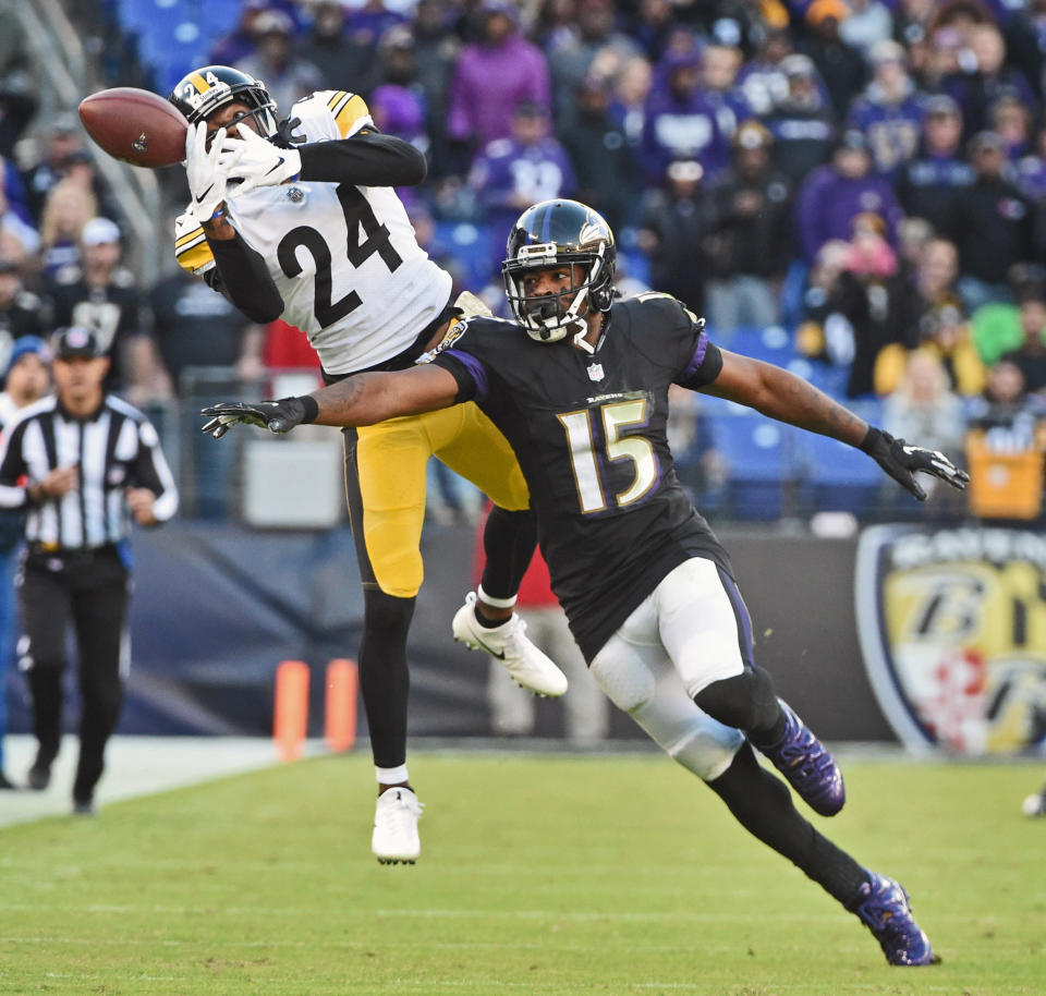 <p>Pittsburgh Steelers’ City Sensabaugh, left, almost intercepted a deep Joe Flacco pass intended for Baltimore Ravens’ Michael Crabtree, right, in the fourth quarter on Sunday, Nov. 4, 2018 at M&T Bank Stadium in Baltimore, Md. The Steelers defeated the Ravens by score of 23-16. (Kenneth K. Lam/Baltimore Sun/TNS) </p>