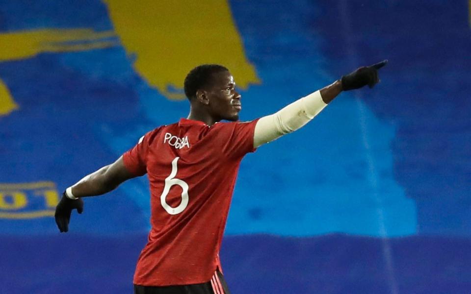 Paul Pogba celebrates scoring a free-kick - Reuters