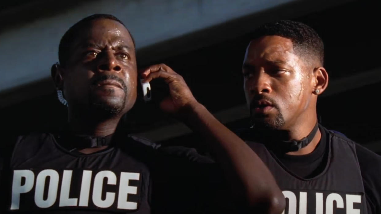  Martin Lawrence takes an upsetting phone call while Will Smith watches in Bad Boys II. 