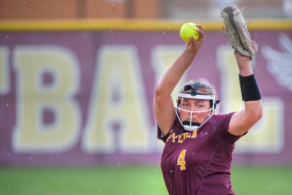 East Peoria pitcher Meadow Terry winds up for a pitch against Dunlap as the rain begins to fall during their Mid-Illini Conference softball game Thursday, May 2, 2024 at Dunlap High School. The game was rained out in the sixth inning with the score tied at two apiece.