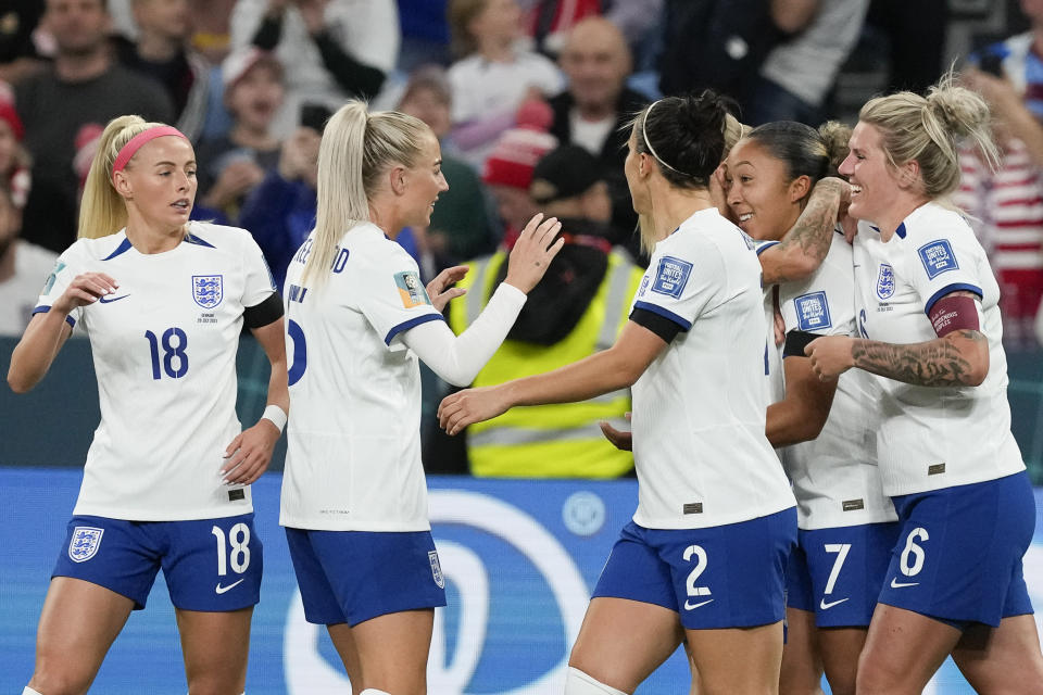 England's Lauren James, right, celebrates after scoring her side's first goal during the Women's World Cup Group D soccer match between England and Denmark at the Sydney Football Stadium in Sydney, Australia, Friday, July 28, 2023. (AP Photo/Mark Baker)