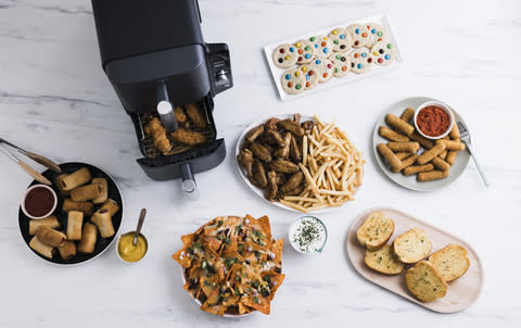 SharkNinja launches the Ninja® DoubleStack™ XL, the industry's first vertical two-basket air fryer that provides double the performance with 40% less countertop footprint. (Photo: Business Wire)