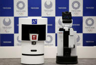 Toyota's DSR (Delivery Support Robot) (L) and HSR (Human Support Robot) are pictured at a demonstration of Tokyo 2020 Robot Project for Tokyo 2020 Olympic Games in Tokyo, Japan, March 15, 2019. REUTERS/Kim Kyung-hoon