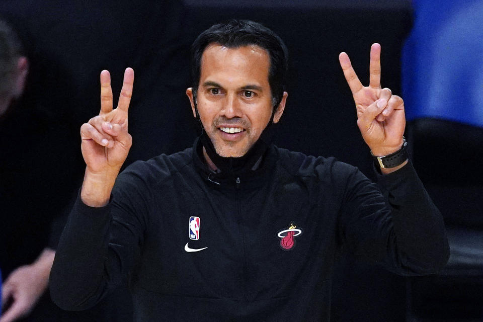 Miami Heat coach Erik Spoelstra gestures to the team during the first half of an NBA basketball game against the Los Angeles Lakers on Saturday, Feb. 20, 2021, in Los Angeles. (AP Photo/Mark J. Terrill)