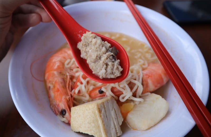 jia li seafood soup - closeup of minced meat