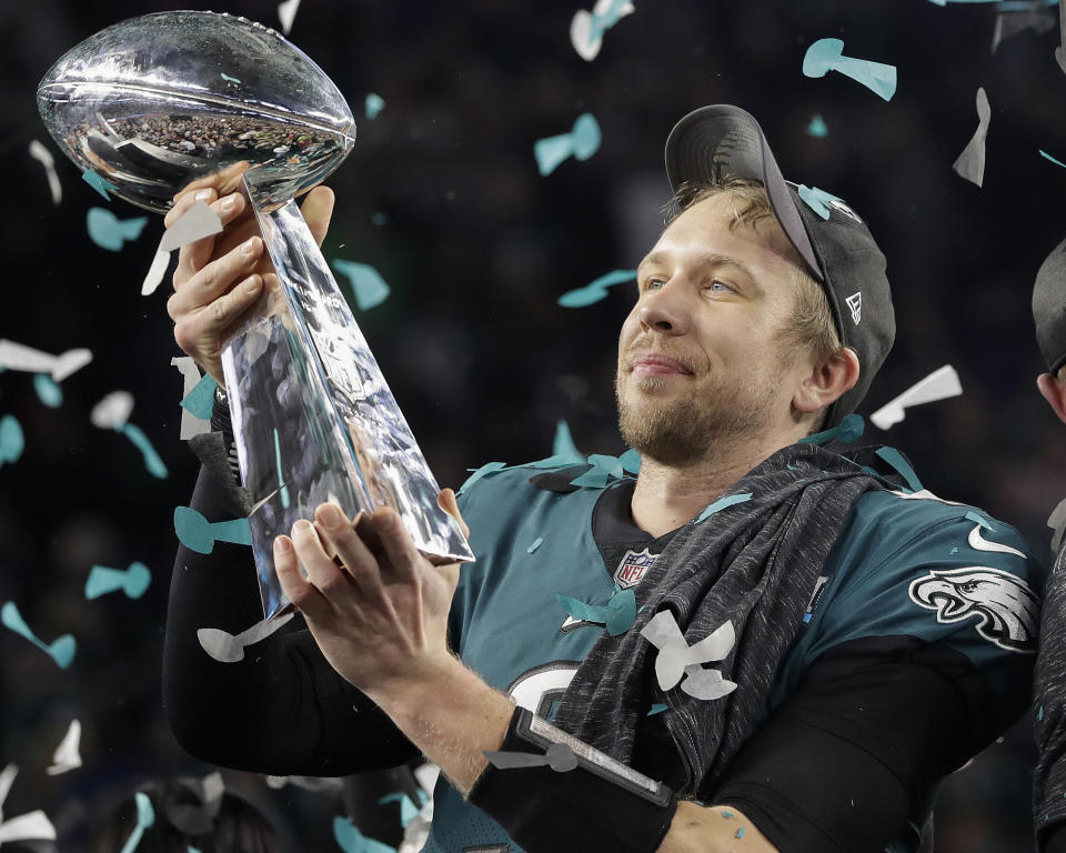 Philadelphia Eagles' Nick Foles holds up the Vince Lombardi Trophy after Super Bowl LII. (AP Photo/Matt Slocum)