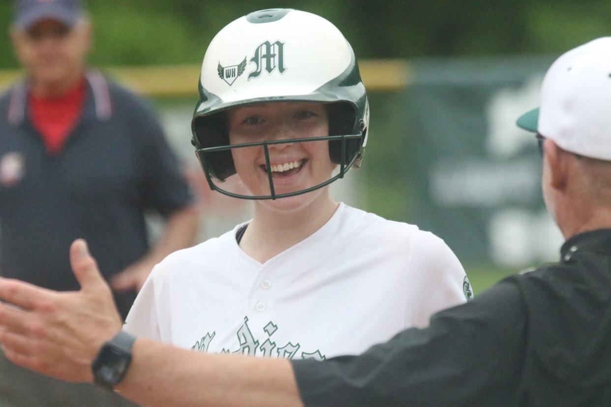 Madison's Emma Stankovich is all smiles after recording a hit early in the Rams 7-5 win over Clear Fork on Monday night.