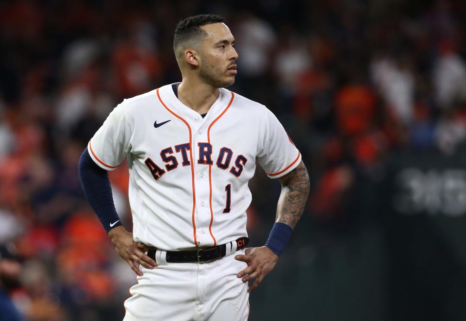 Houston Astros shortstop Carlos Correa reacts after striking out against the Atlanta Braves during the sixth inning in Game 6 of the World Series.