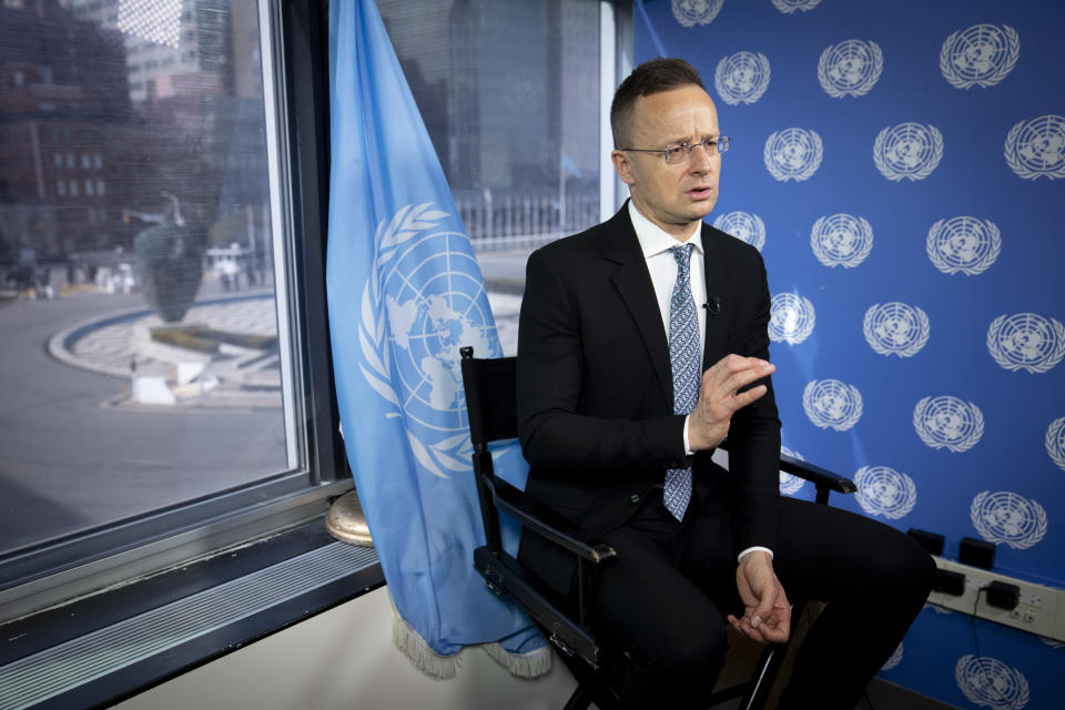 Peter Szijjarto, Minister of Foreign Affairs of Hungary, is interviewed by The Associated Press, Friday, March 24, 2023, at United Nations headquarters. Szijjarto said Friday that his country has not voted on whether to allow Finland and Sweden to join NATO because Hungarian lawmakers are sick of those countries' critiques of Hungarian domestic affairs. (AP Photo/John Minchillo)