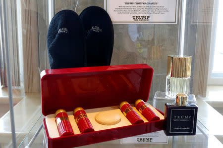 Trump Soho slippers, a Trump Casino Hotel toiletry kit, and Trump “The Fragrance” are displayed at The Trump Museum near the Republican National Convention in Cleveland, Ohio, U.S., July 19, 2016. REUTERS/Lucas Jackson