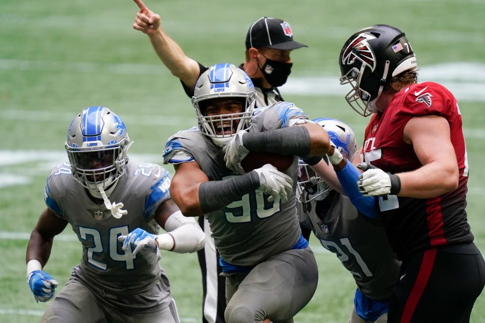 Lions defensive end Trey Flowers celebrates during the second half of the Lions' 23-22 win on Sunday, Oct. 25, 2020, in Atlanta.