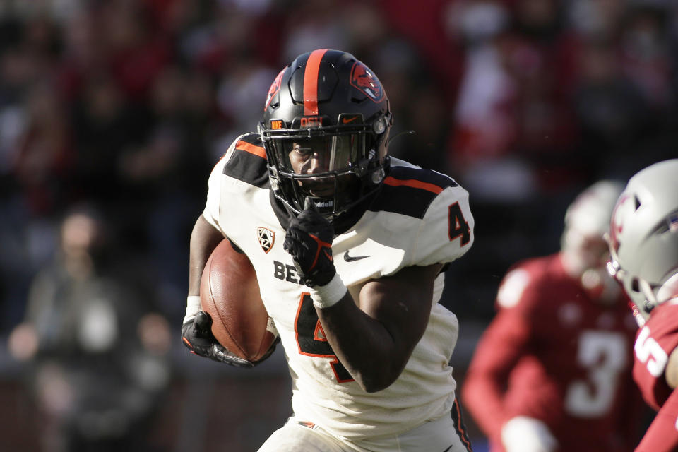 Oregon State running back B.J. Baylor carries the ball during the second half of an NCAA college football game against Washington State, Saturday, Oct. 9, 2021, in Pullman, Wash. Washington State won 31-24. (AP Photo/Young Kwak)