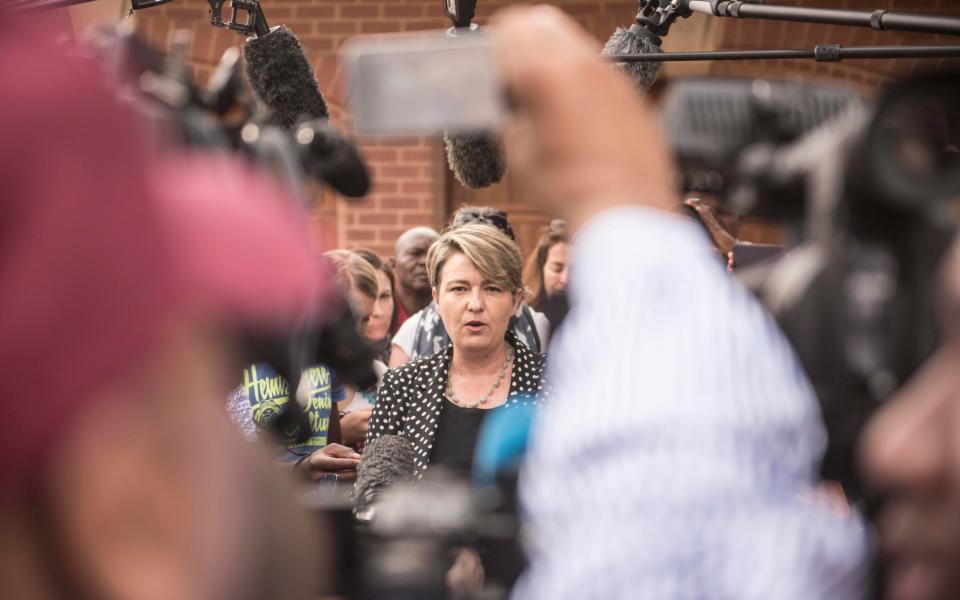 Anneliese Burgess addressing the media outside Arnold Pistorius's house in 2015