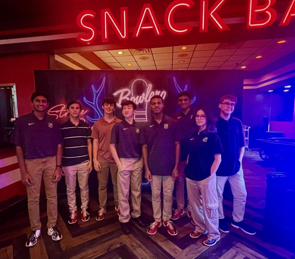 The Suncoast bowling team celebrates victory against Palm Beach Lakes in competition on Wednesday in Palm Beach County.