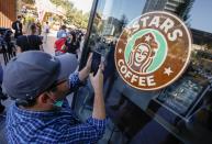 Starbucks shops reopen in Russia under new name Stars Coffee