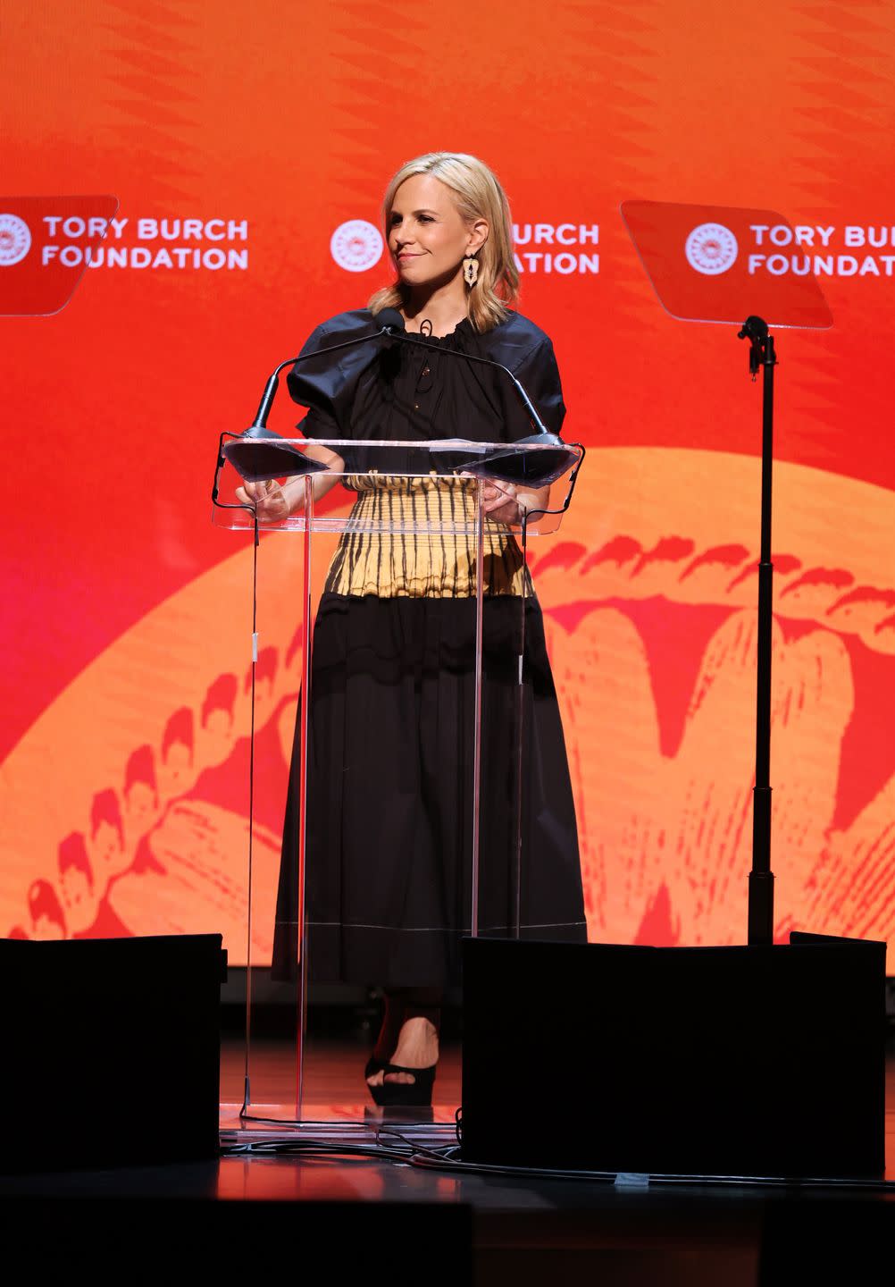 tory burch speaks onstage at the 2022 embrace ambition summit