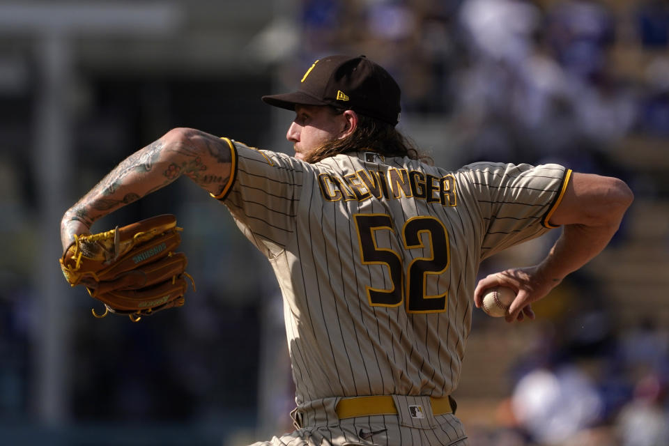 San Diego Padres starting pitcher Mike Clevinger throws to the plate during the first inning of a baseball game against the Los Angeles Dodgers Sunday, Sept. 4, 2022, in Los Angeles. (AP Photo/Mark J. Terrill)