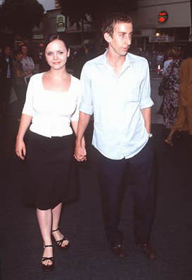 Christina Ricci and a lucky fella at the Westwood premiere of Dreamworks' Saving Private Ryan