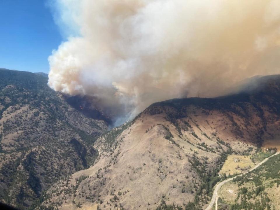 The 4.4-square kilometre Keremeos Creek wildfire, about 21 kilometres south of Penticton, B.C., is seen in an aerial photograph on Sunday afternoon. (Submitted by B.C. Wildfire Service - image credit)