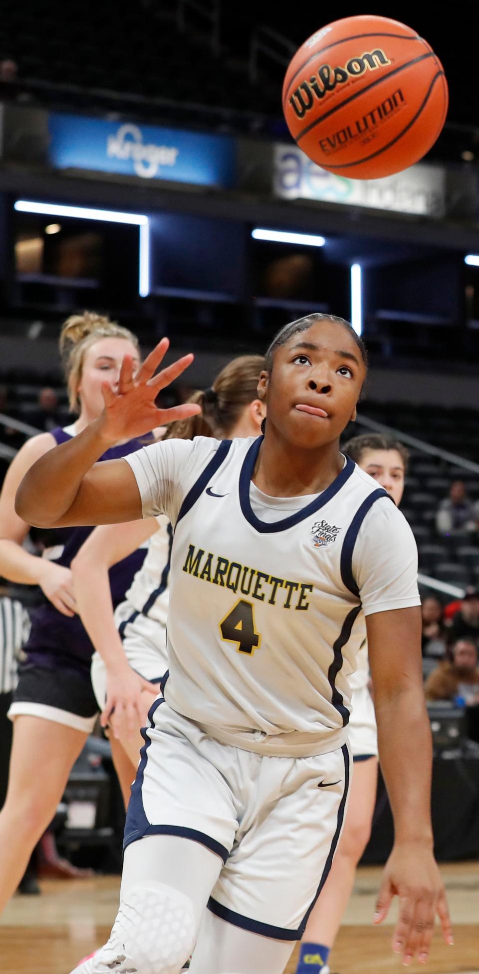 Marquette Blazers guard Laniah Davis (4) goes for a rebound during the IHSAA girls basketball Class 1A state championship against the Lanesville Eagles, Saturday, Feb. 24, 2024, at Gainbridge Fieldhouse in Indianapolis. Lanesville Eagles won 51-43.