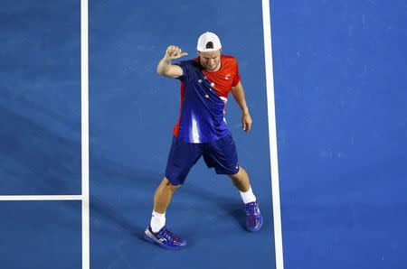 Australia's Lleyton Hewitt reacts to the crowd after losing his second round match against Spain's David Ferrer at the Australian Open tennis tournament at Melbourne Park, Australia, January 21, 2016. REUTERS/Jason O'Brien