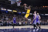 Indiana Pacers' Aaron Nesmith (23) puts up a shot against Sacramento Kings' Kevin Huerter (9) during the second half of an NBA basketball game, Friday, Feb. 3, 2023, in Indianapolis. (AP Photo/Darron Cummings)