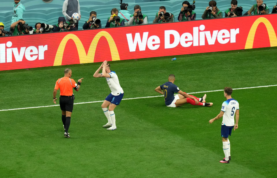 Referee Wilton Sampaio rebukes England's Jordan Henderson during the FIFA World Cup Quarter-Final match at the Al Bayt Stadium in Al Khor, Qatar. Picture date: Saturday December 10, 2022.