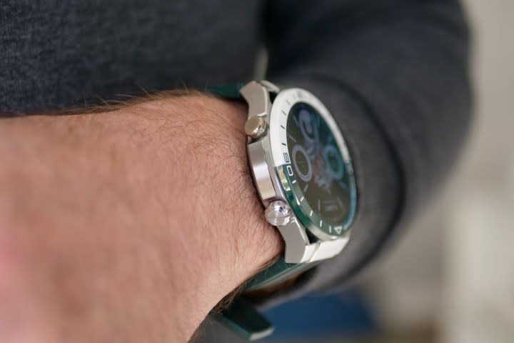 A person wearing a Huawei Watch Ultimate.