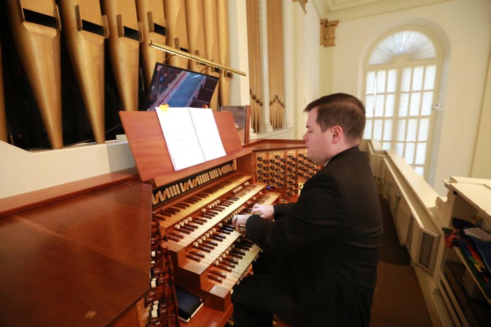 Justin Addington, minister of music, plays the  E. M. Skinner pipe organ at First Baptist Church Savannah.