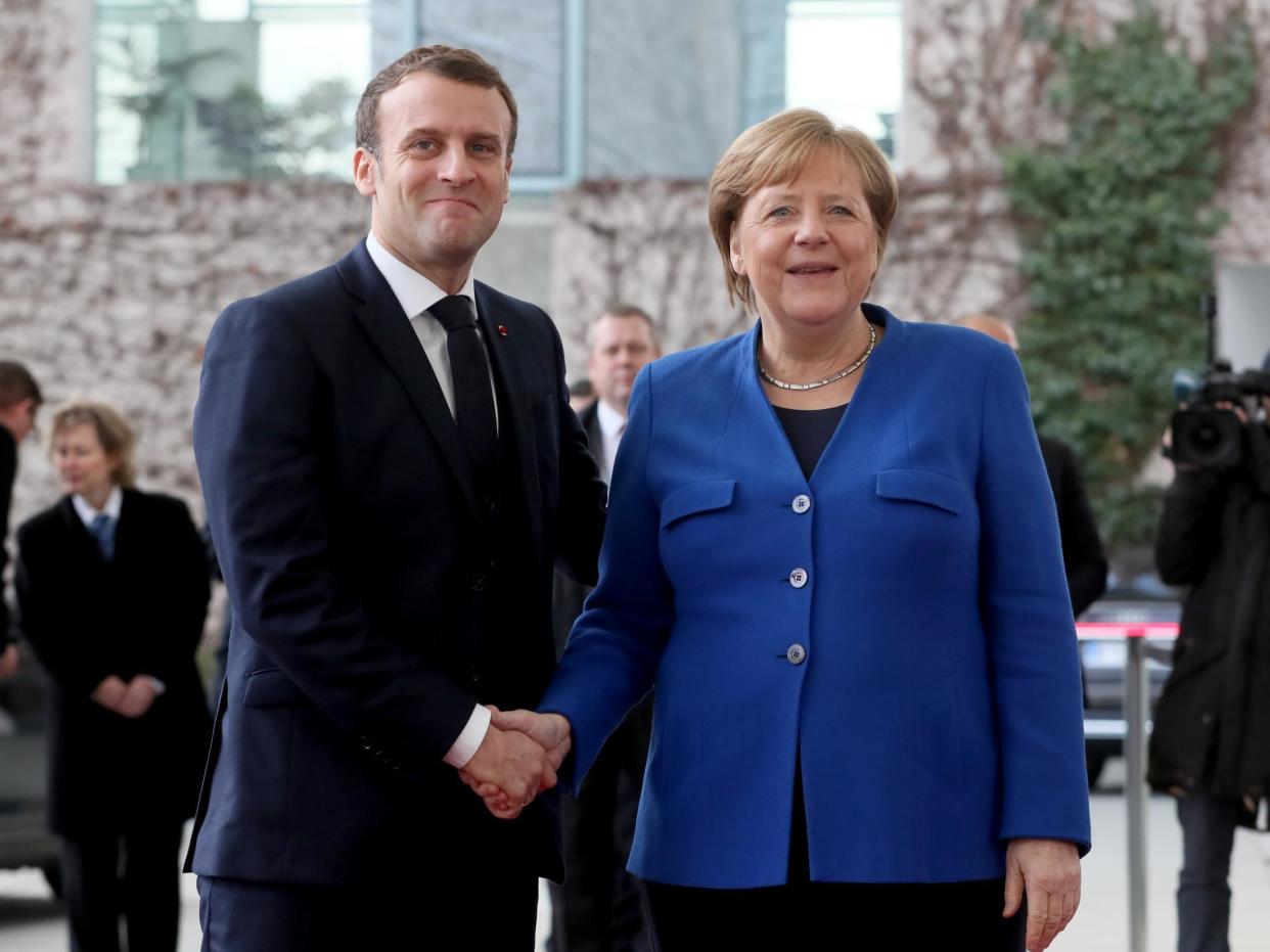 Angela Merkel, the German chancellor, welcomes Emmanuel Macron, the French president, for the International Libya Conference in Berlin, 19 January, 2020: EPA-EFE