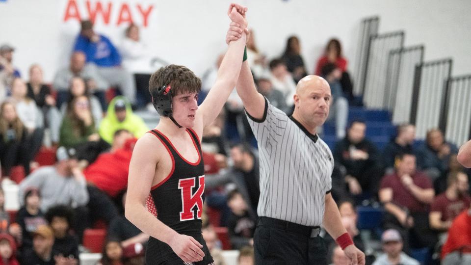 Kingsway's Brendan Callahan has his arm raised after Callahan defeated Washington Township's Jackson Hoopes, 2-0, during the 132 lb. bout of the South Jersey Group 5 semifinal meet held at Washington Township High School on Monday, February 6, 2023. 