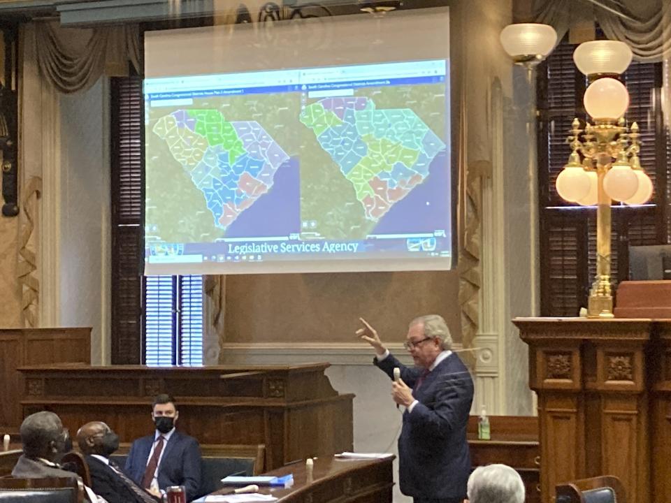 FILE - Sen. Dick Harpootlian, D-S.C., compares his proposed map of House districts drawn with 2020 Census data to a plan supported by Republicans on Jan. 20, 2022, in Columbia, S.C. A federal court ruled Thursday, March 28, 2024, that this year's congressional elections in South Carolina will be held under a map that it had already deemed unconstitutional and discriminatory against Black voters, with time running out ahead of voting deadlines, and the lack of a decision by the Supreme Court. (AP Photo/Jeffrey Collins, File)