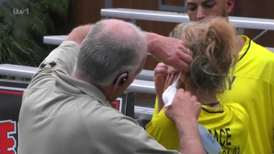 Dent receiving medical attention during the cockroach incident (I’m A Celebrity... Get Me Out Of Here!, ITV)