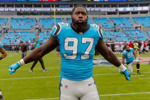 Carolina Panthers' Mario Addison (97) warms up before an NFL football game against the Atlanta Falcons in Charlotte - Credit: AP Photo/Bob Leverone