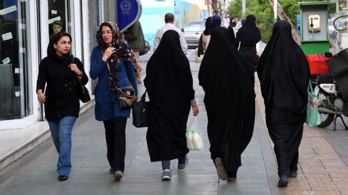 Iranian police have announced a new campaign to force women to wear the Islamic headscarf.  -Vahid Salemi/AP