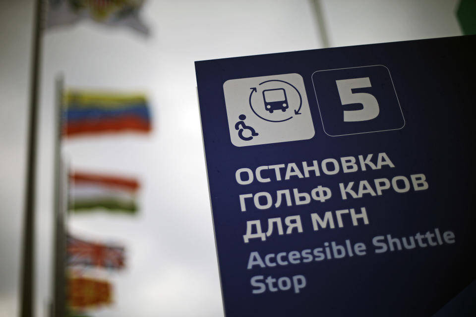 A sign indicating a shuttle stop for people with disabilities stands in Olympic Park in Sochi, Russia, at the 2014 Winter Olympics on Tuesday, Feb. 18, 2014. Some wheelchair-bound passengers have found that bus drivers frequently don't know how to use the lifts, forcing them to either demonstrate themselves or wait for another bus. But Olympic organizers say the drivers will be trained and ready when the Paralympics begin in less than three weeks. (AP Photo/David Goldman)