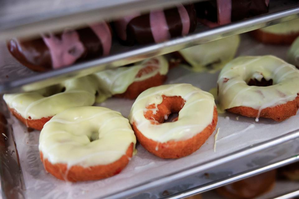 Strawberry lemonade donuts sit on a cooling rack at Island Donuts in Atlantic Beach, Fla.